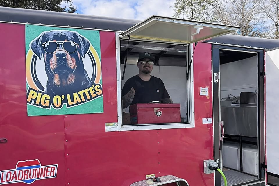 Hathaway Criteser inside the Pig O’Latte’s food truck on Riverbanks Road in Grants Pass Oregon
