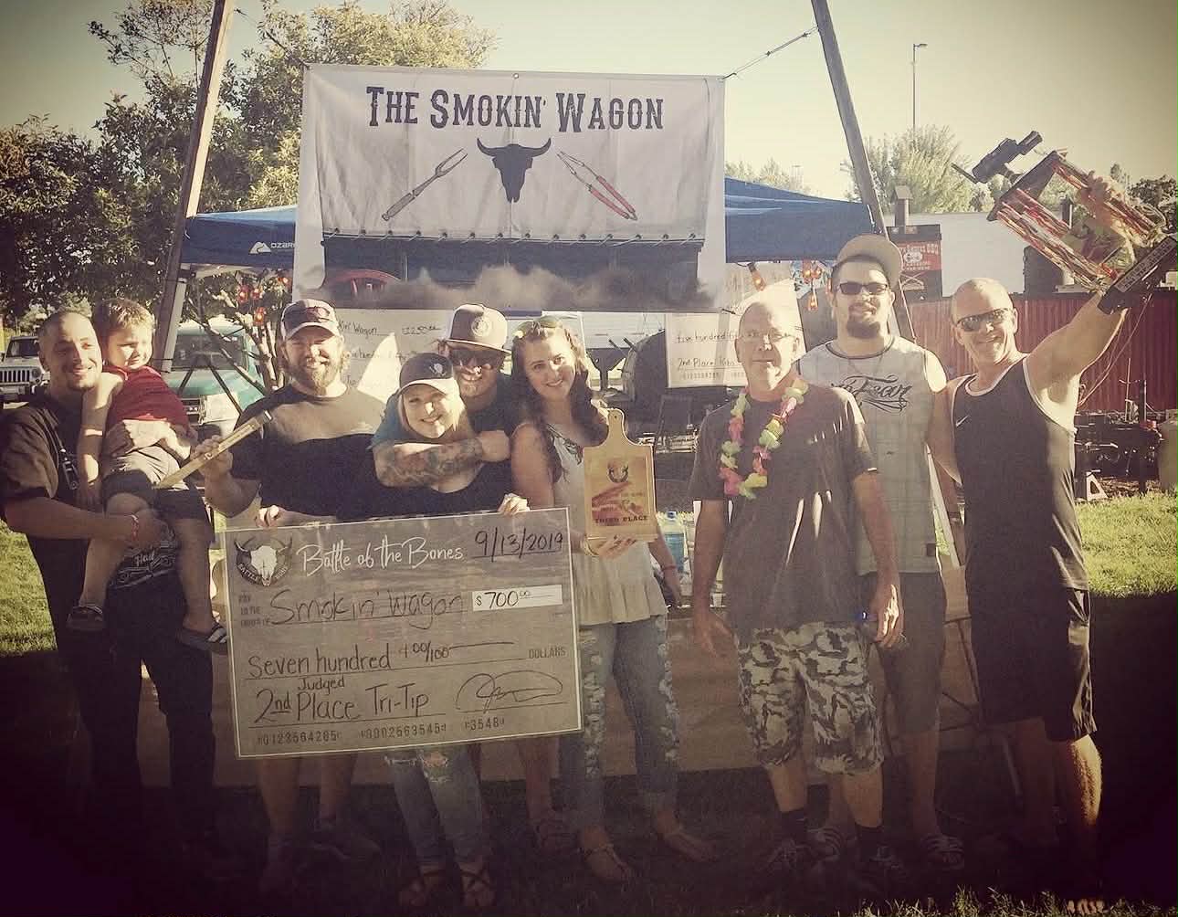 Pig-O-Latte’s team holding awards at Battle of the Bands at the Expo in Central Point, Oregon