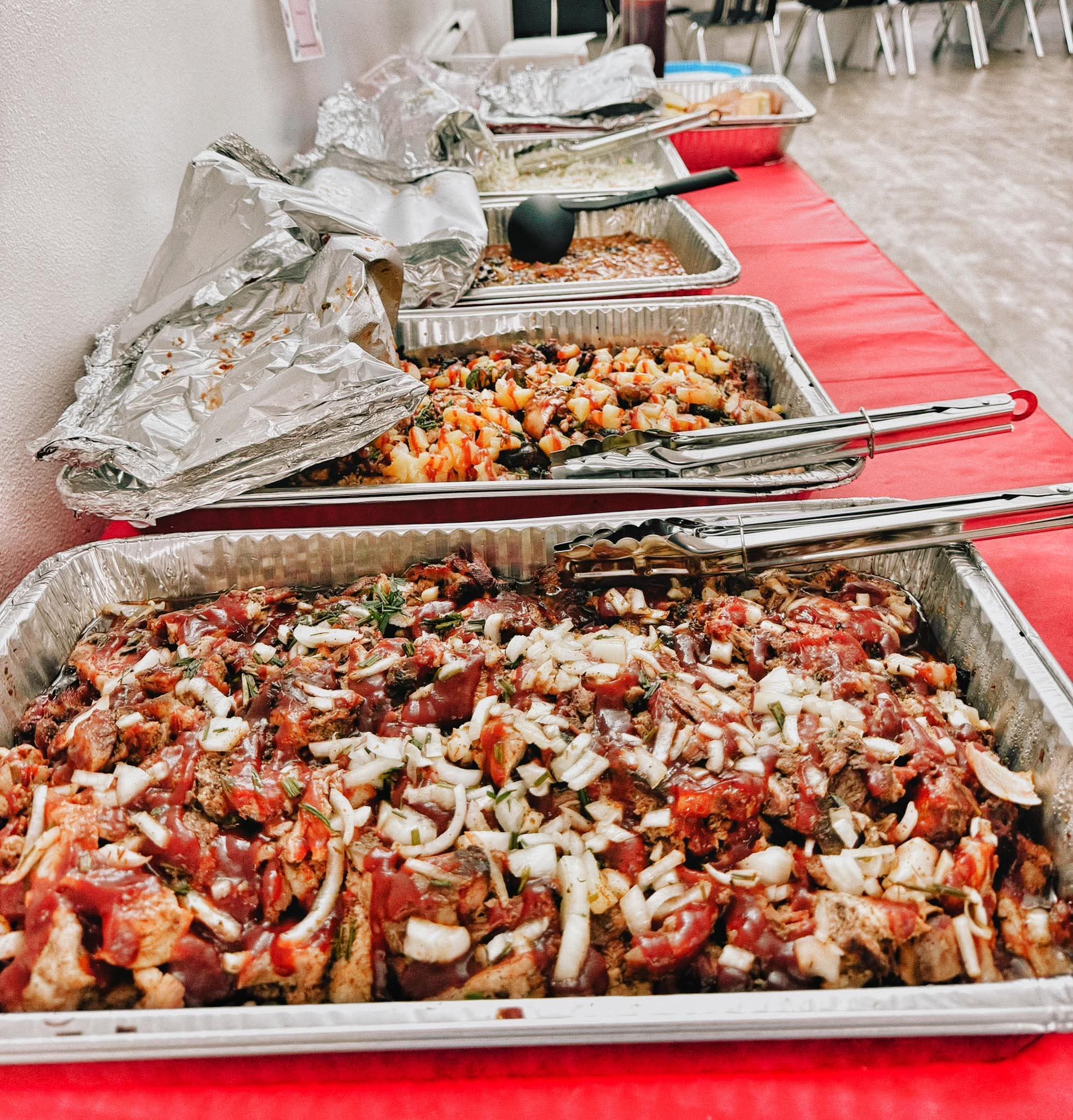 Pig O'Latte's BBQ catering trays ready for a group lunch